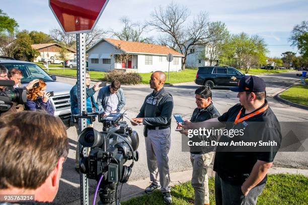 Police barricade the area surrounding the home of suspected Austin bomber Mark Anthony Conditt March 21, 2018 in Pflugerville, Texas. Conditt blew...