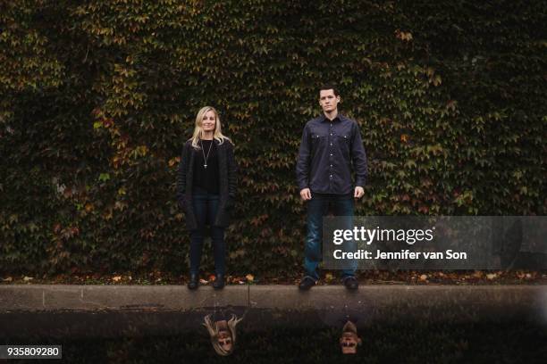 portrait of mid adult couple, standing in front of foliage - whitby ontario canada stock pictures, royalty-free photos & images