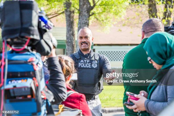 Police barricade the area surrounding the home of suspected Austin bomber Mark Anthony Conditt March 21, 2018 in Pflugerville, Texas. Conditt blew...