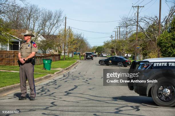 Police barricade the area surrounding the suspected Austin bomber's home on March 21, 2018 in Pflugerville, Texas. Conditt blew himself up near a...