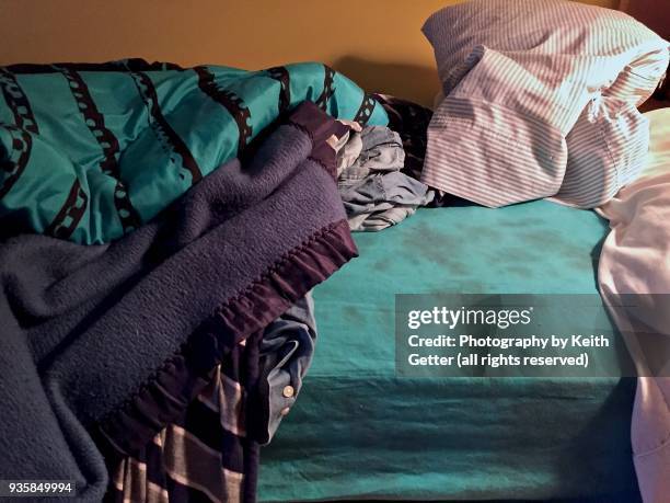 an unmade bed in a bedroom - pillow case stock pictures, royalty-free photos & images