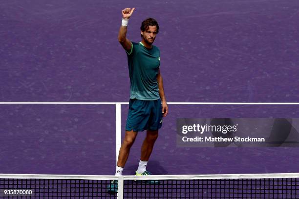 Joao Sousa of Portugal celebrates his win over Ryan Harrison during the Miami Open on March 21, 2018 in Key Biscayne, Florida.