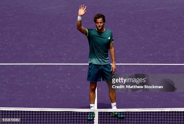 Joao Sousa of Portugal celebrates his win over Ryan Harrison during the Miami Open on March 21, 2018 in Key Biscayne, Florida.