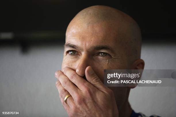 French former international and Real Madrid's head coach Zinedina Zidane gives a press conference before a gala football match as part of the Defis...