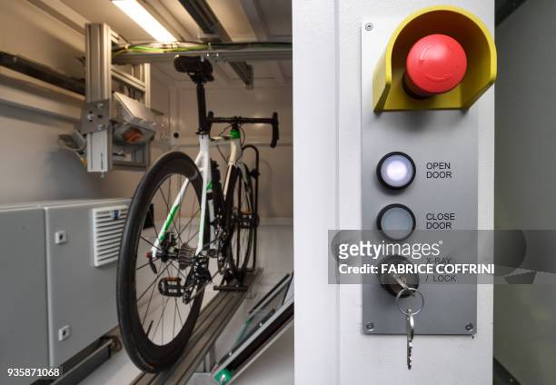 Bicycle is placed inside an new International Cycling Union mobile X-ray machine box during a press conference unveiling a beefed-up set of measures...