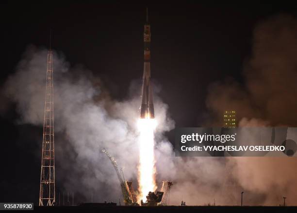 Russia's Soyuz MS-08 spacecraft carrying the members of the International Space Station expedition 55/56, NASA astronauts Andrew Feustel and Richard...