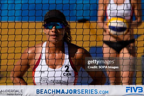 Brandie Wilkerson of Team Canada on the net giving the instructions with the signs to look for the point before the selection of Finland who defeated...