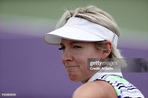 Bethanie Mattek Sands looks on during her match against Alize Cornet of France during Day 3 of the Miami Open at the Crandon Park Tennis Center on...