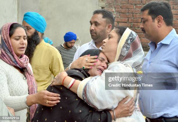 Sukhwinder Kaur mother of Manjinder Singh one of the workers killed in Iraq's Mosul showing her sorrow when Punjab State Women's Commission...