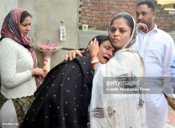 Sukhwinder Kaur mother of Manjinder Singh one of the workers killed in Iraq's Mosul showing her sorrow when Punjab State Women's Commission...
