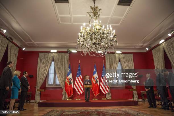 Sebastian Pinera, Chile's president, center, speaks during a press conference with Felipe Larrain, Chile's finance minister, top right, and Steven...