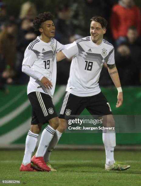 Linton Maina of Germany and Adrian Fein celebrate after the second goal during the Under 19 Euro Qualifier between Germany and Scotland on March 21,...