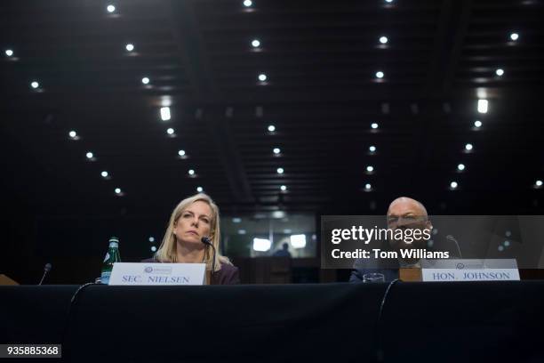 Jeh Johnson, former Homeland Security Secretary, and current Secretary Kirstjen Nielsen, testify during a Senate Intelligence Committee hearing in...