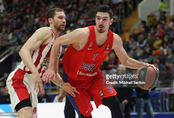 Nando de Colo, #1 of CSKA Moscow competes with Janis Strelnieks, #13 of Olympiacos Piraeus in action during the 2017/2018 Turkish Airlines EuroLeague...