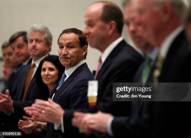 United Airlines CEO Oscar Munoz arrives at the head table before delivering remarks on the long-term strategy for the airline to the Executives' Club...