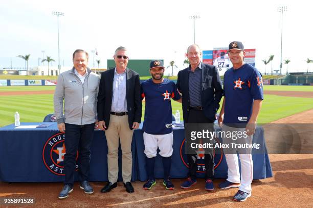 Agent Scott Boras, Astros General Manager Jeff Luhnow, Jose Altuve, Astros Owner Jim Crane, and manager AJ Hinch pose for a photo during a press...