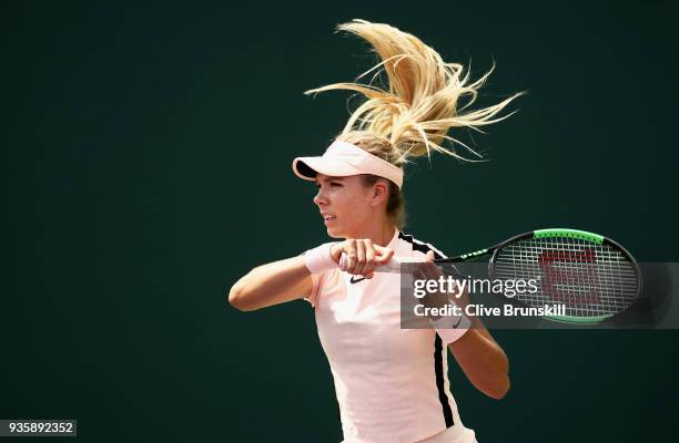 Katie Boulter of Great Britain in action against Su-Wei Hsieh of Taipei in their first round match during the Miami Open Presented by Itau at Crandon...