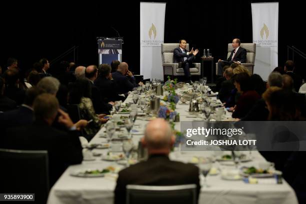 United Airlines Chief Executive Officer Oscar Munoz speaks at the Executives' Club Program in Chicago, Illinois on March 21, 2018. / AFP PHOTO /...
