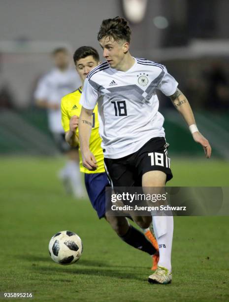 Adrian Fein of Germany controls the ball during the Under 19 Euro Qualifier between Germany and Scotland on March 21, 2018 in Lippstadt, Germany.