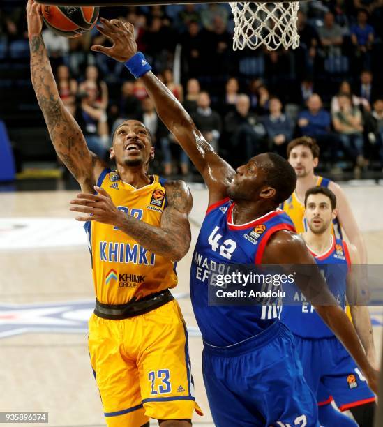 Bryant Dunston of Anadolu Efes in action against Malcolm Thomas of Khimki during the Turkish Airlines Euroleague week 27 basketball match between...