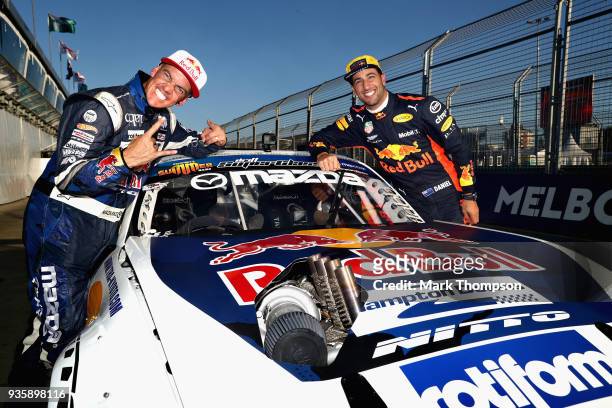 Daniel Ricciardo of Australia and Red Bull Racing with drifiting superstar Mad Mike during previews ahead of the Australian Formula One Grand Prix at...
