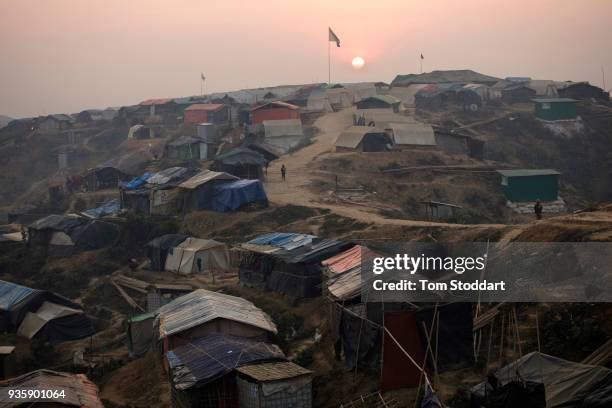 The sun rises over Balukali refugee camp on February 27, 2018 at Cox's Bazar, Bangladesh. Over 655,000 Rohingya have arrived in the area since August...