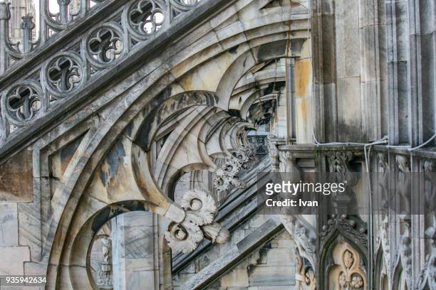 high section of duomo di milano against clear sky - catedral de milán fotografías e imágenes de stock