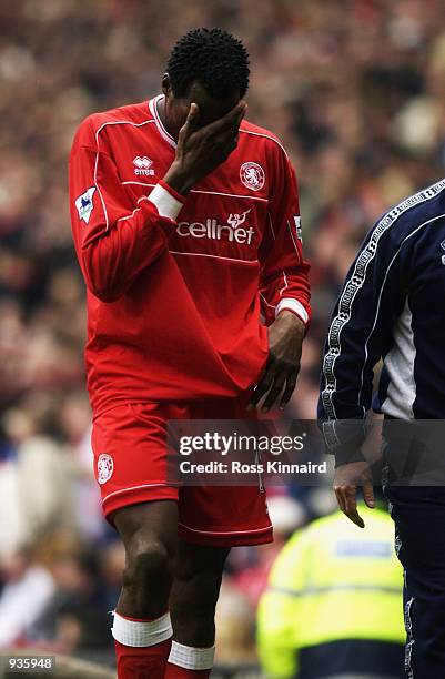 Ugo Ehiogu of Middlesbrough leaves the field in despair after losing the AXA FA Cup Semi Final match against Arsenal at Old Trafford,Manchester....