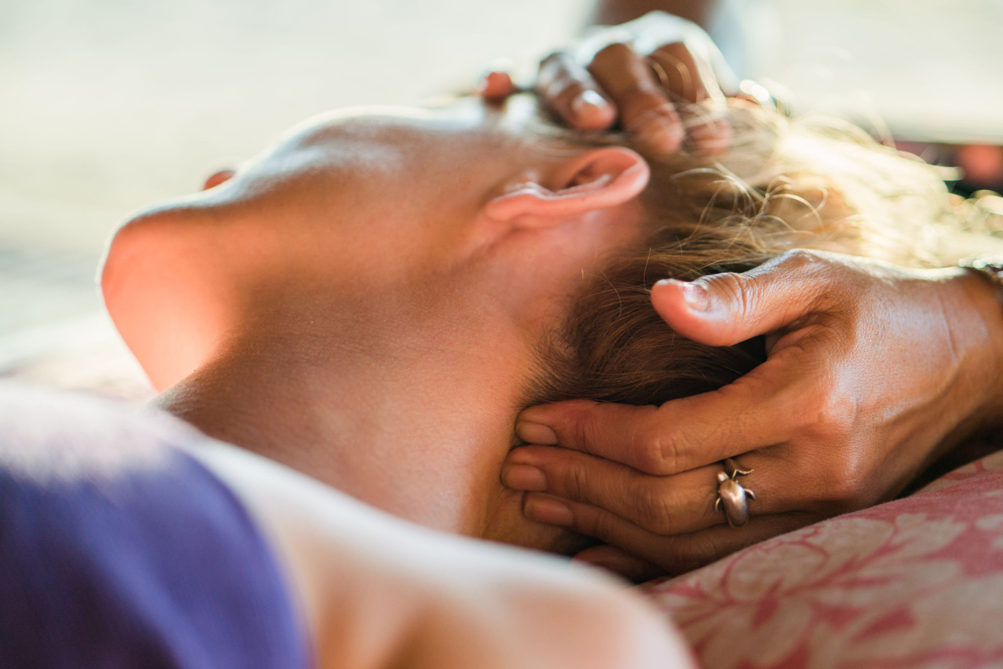 Close up of a woman having head massage at the spa. Close up of a woman having head massage at the spa.