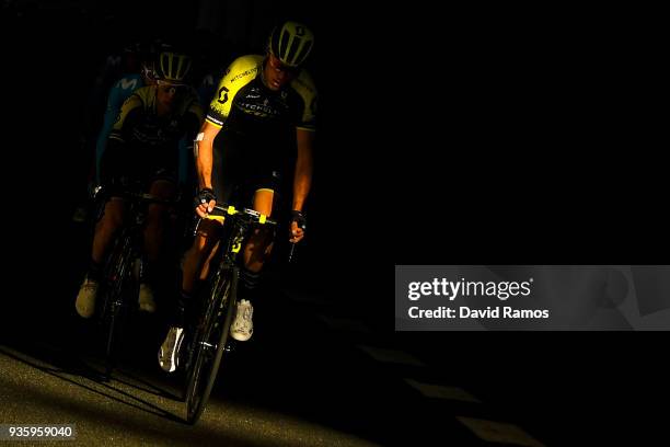 Rob Power of Australia and Simon Yates of Great Britan and Team Mitchelton-Scott and lead the peloton as they head up the Coll de Collabos during the...