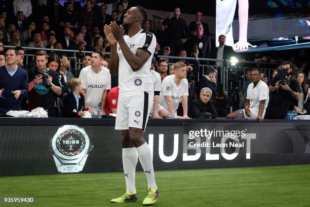 Manchester United manager Jose Mourinho watches from the sidelines as Jamaican sprinter Usain Bolt takes part in a 'Match Of Friendship' to promote...