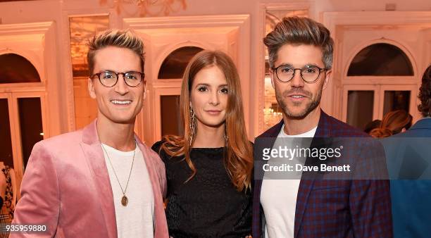 Oliver Proudlock, Millie Mackintosh and Darren Kennedy attend the House of Fraser SS18 launch dinner at One Belgravia on March 21, 2018 in London,...