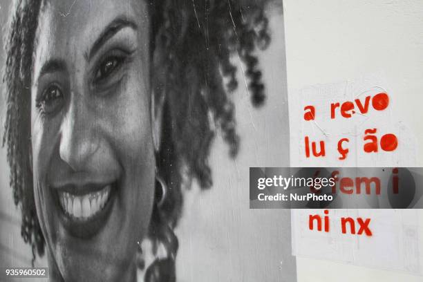 Big collage with photo of Deputy Mayor of Rio de Janeiro Marielle Franco, is seen in the stairwell of Cristiano Viana Street, in the neighborhood of...