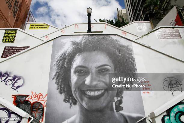 Big collage with photo of Deputy Mayor of Rio de Janeiro Marielle Franco, is seen in the stairwell of Cristiano Viana Street, in the neighborhood of...