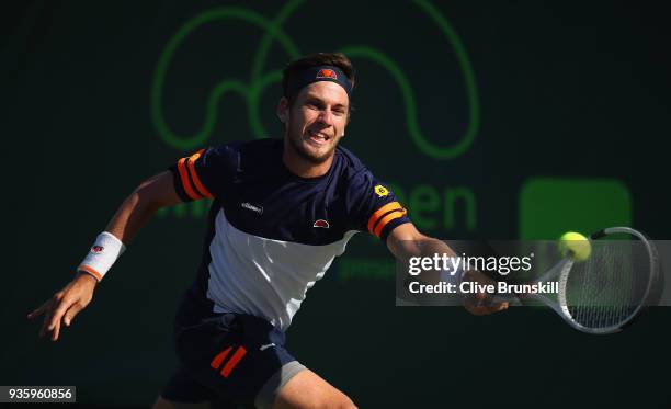 Cameron Norrie of Great Britain plays a forehand against Nicolas Jarry of Chilie during the Miami Open Presented by Itau at Crandon Park Tennis...