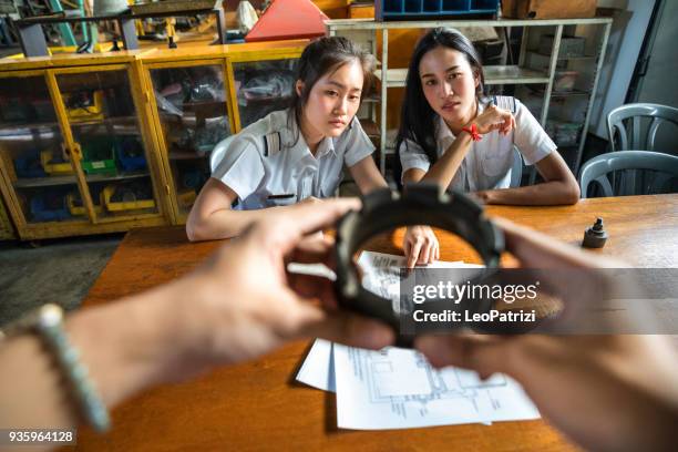 aviation university students attending to class - flight suit stock pictures, royalty-free photos & images