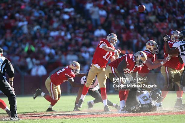Alex Smith of the San Francisco 49ers passes the ball during the NFL game against the Jacksonville Jaguars at Candlestick Park on November 29, 2009...