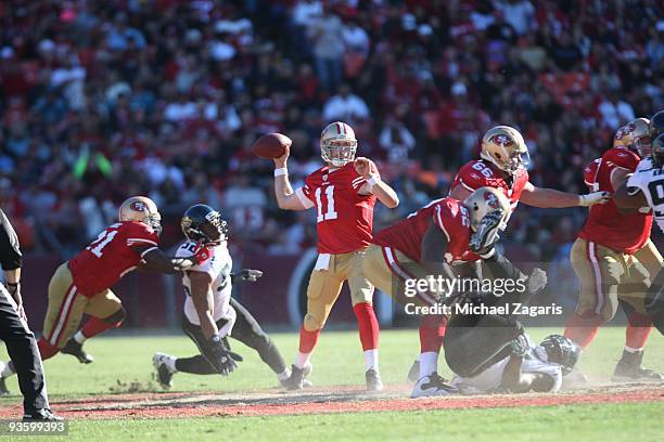 Alex Smith of the San Francisco 49ers passes the ball during the NFL game against the Jacksonville Jaguars at Candlestick Park on November 29, 2009...