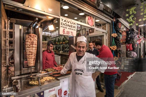 doner kebap stall and posing cook, at besiktas,istanbul turkey - donker stock pictures, royalty-free photos & images