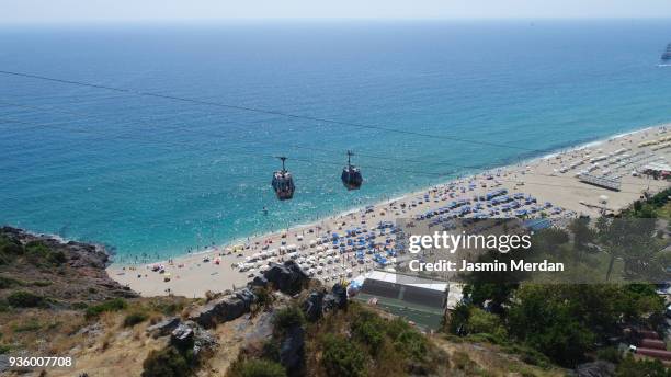 cable car above beach - sugar loaf bildbanksfoton och bilder