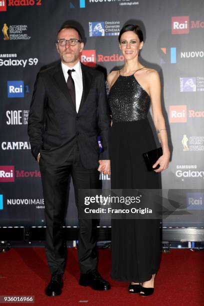 Valerio Mastandrea and Chiara Martegiani walk a red carpet ahead of the 62nd David Di Donatello awards ceremony on March 21, 2018 in Rome, Italy.