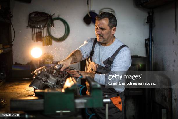cleaning engine indoors - socket wrench stock pictures, royalty-free photos & images