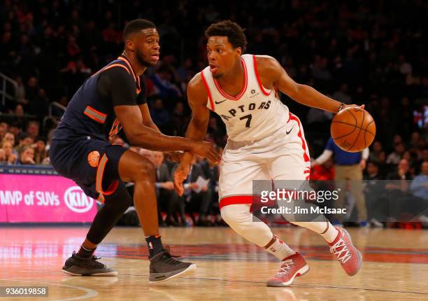 Kyle Lowry of the Toronto Raptors in action against Emmanuel Mudiay of the New York Knicks at Madison Square Garden on March 10, 2018 in New York...