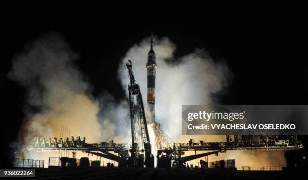 Russia's Soyuz MS-08 spacecraft carrying the members of the International Space Station expedition 55/56, NASA astronauts Andrew Feustel and Richard...