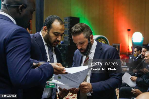 Former Zamalek midfielder Hazem Emam assist CAF Deputy General Secretary Anthony Baffoe to conduct the draw on Wednesday, 21 March 2018 in Cairo,...