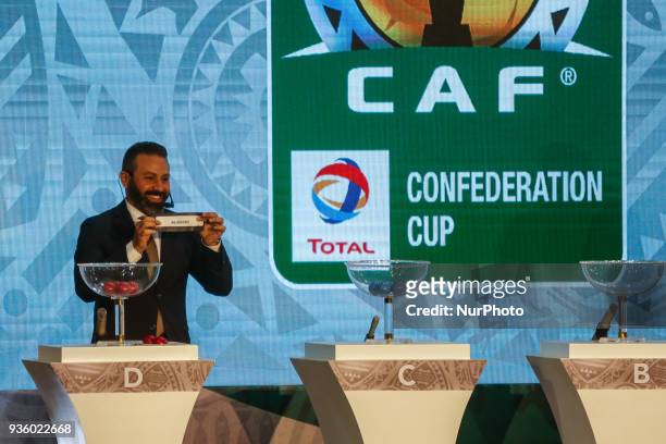Former Zamalek midfielder Hazem Emam assist CAF Deputy General Secretary Anthony Baffoe to conduct the draw on Wednesday, 21 March 2018 in Cairo,...