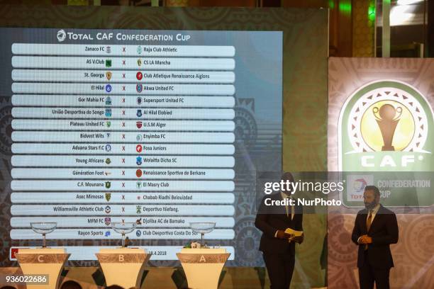 Former Zamalek midfielder Hazem Emam assist CAF Deputy General Secretary Anthony Baffoe to conduct the draw on Wednesday, 21 March 2018 in Cairo,...