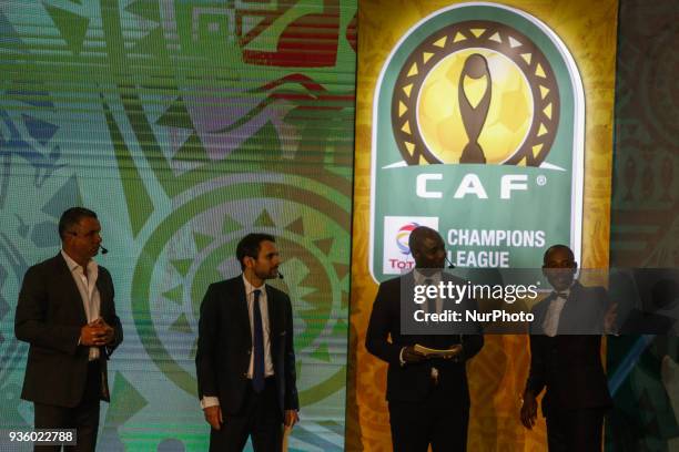 Ambassadors for the CAF Interclubs, Angolan Gilberto and South African Mark Fish assist CAF General Secretary Amr Fahmy and CAF Deputy General...