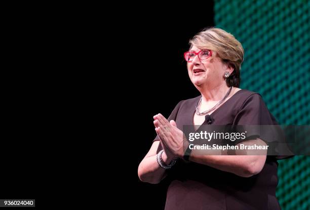 Starbucks executive vice presiden and chief partner officer Lucy Helm speaks during the Starbucks Annual Shareholders Meeting at McCaw Hall, on March...