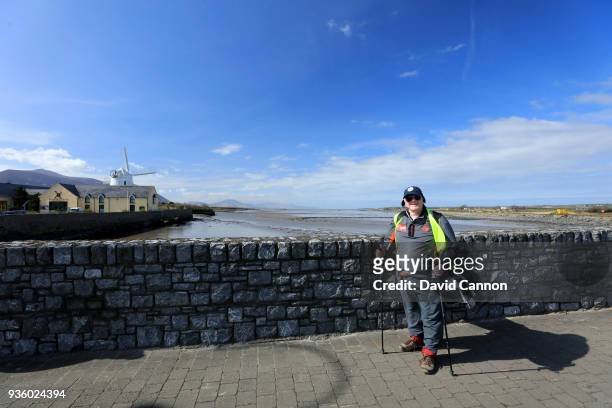 Nick Edmund of England poses on the bridge at Blennerville after leaving Tralee Golf Club on another leg of his 2000km walk for his charity 'Global...